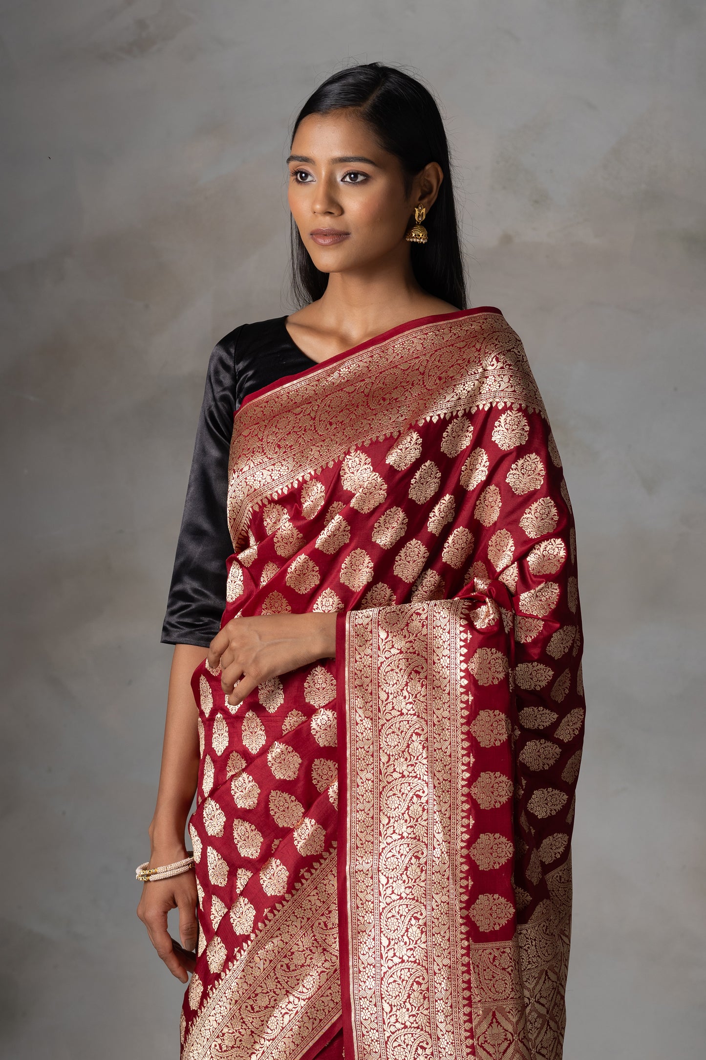 Deep Maroon Kadilyal Banarasi Silk Saree with Golden Zari Work