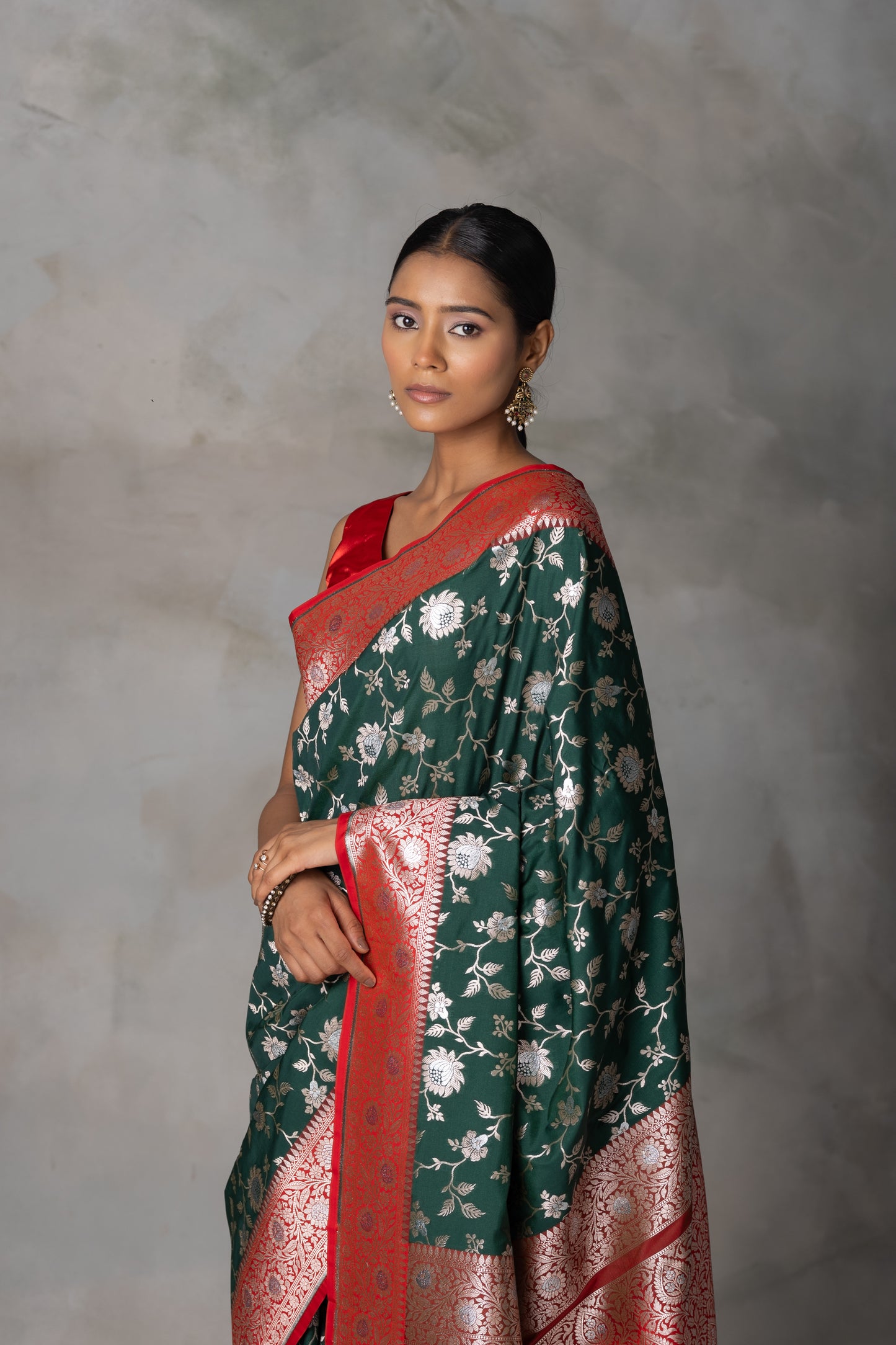 Elegant Bottle Green Banarasi Silk Saree with Red Border & Gold-Silver Zari
