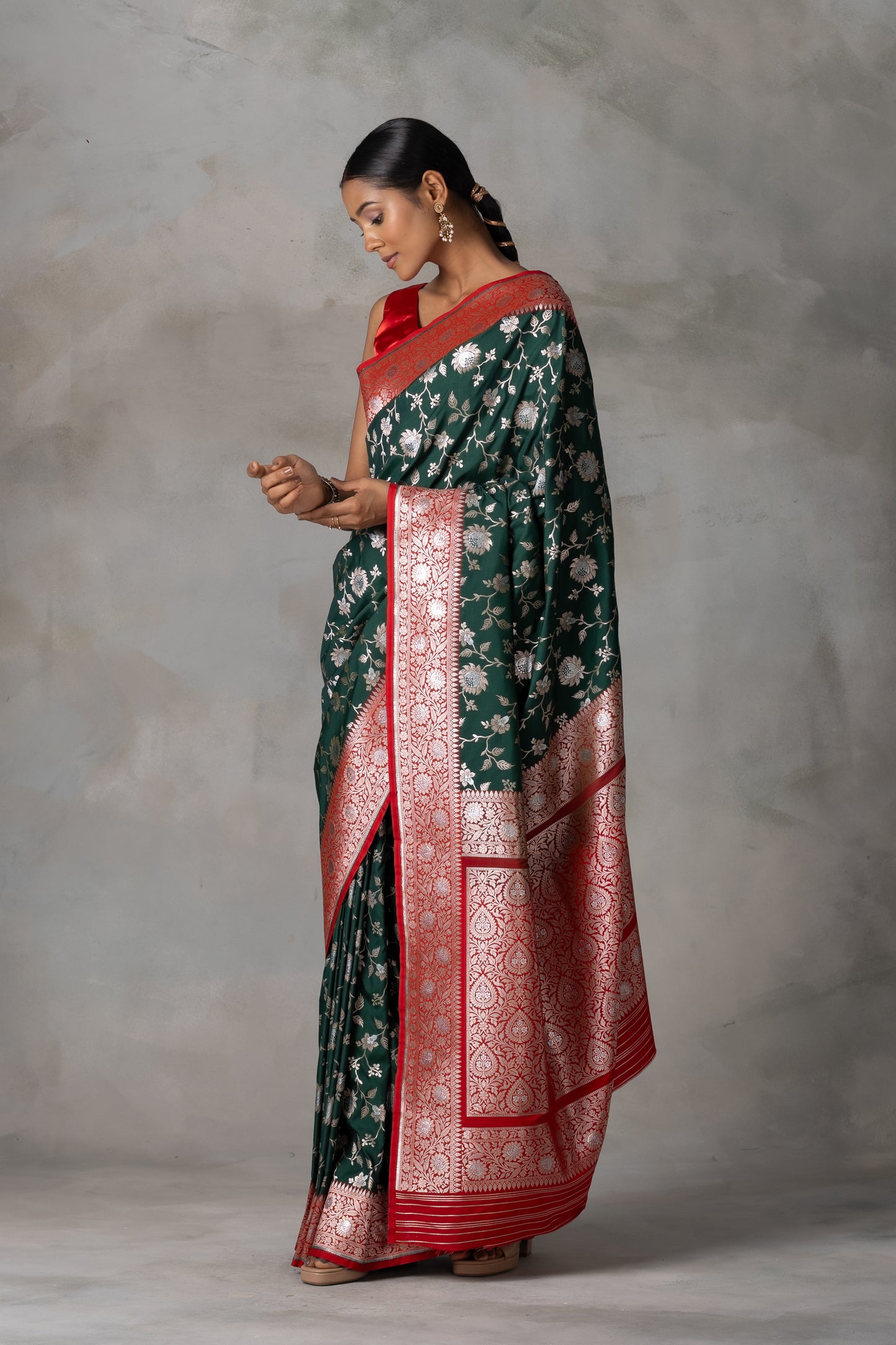 Elegant Bottle Green Banarasi Silk Saree with Red Border & Gold-Silver Zari