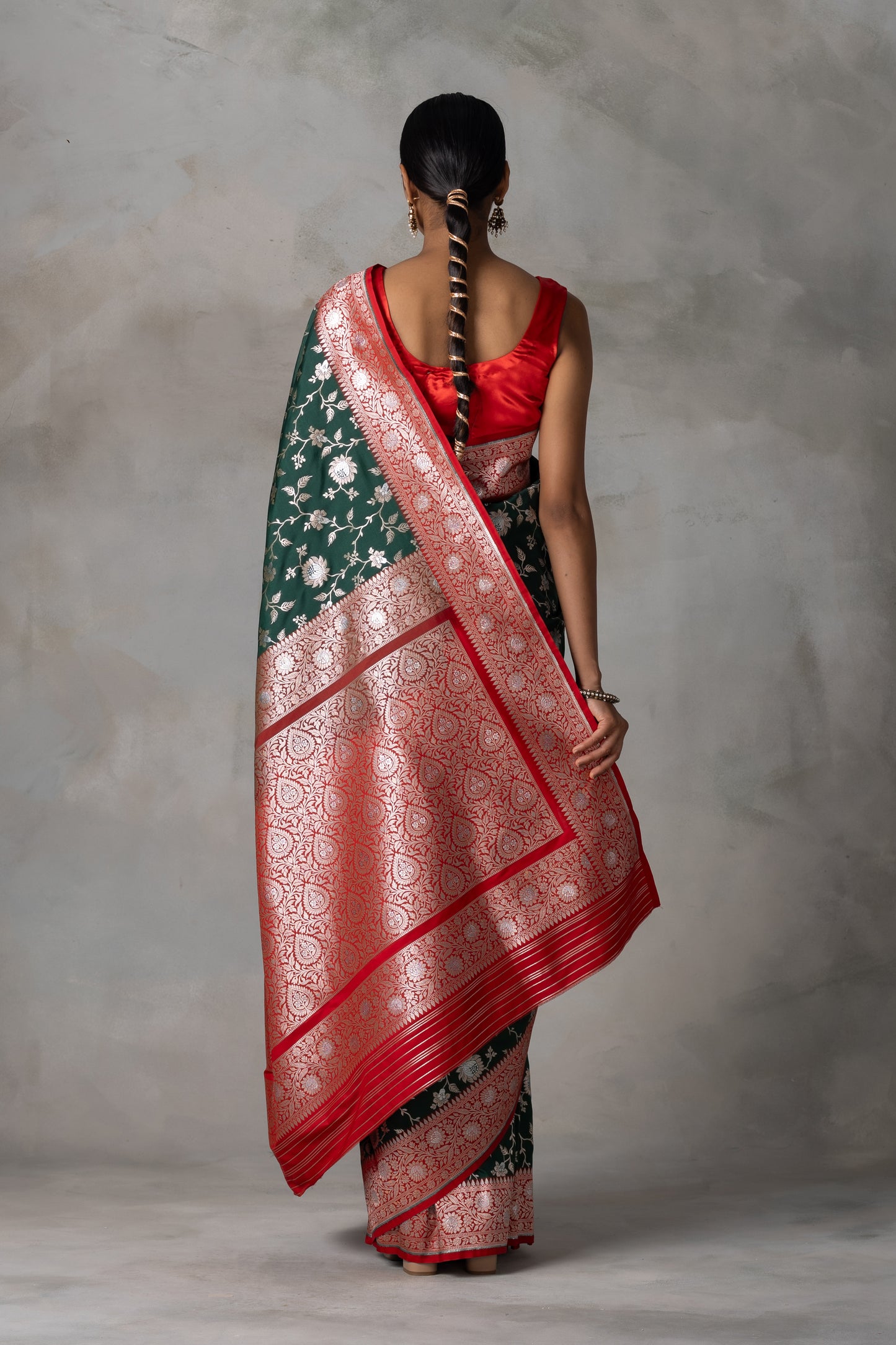 Elegant Bottle Green Banarasi Silk Saree with Red Border & Gold-Silver Zari