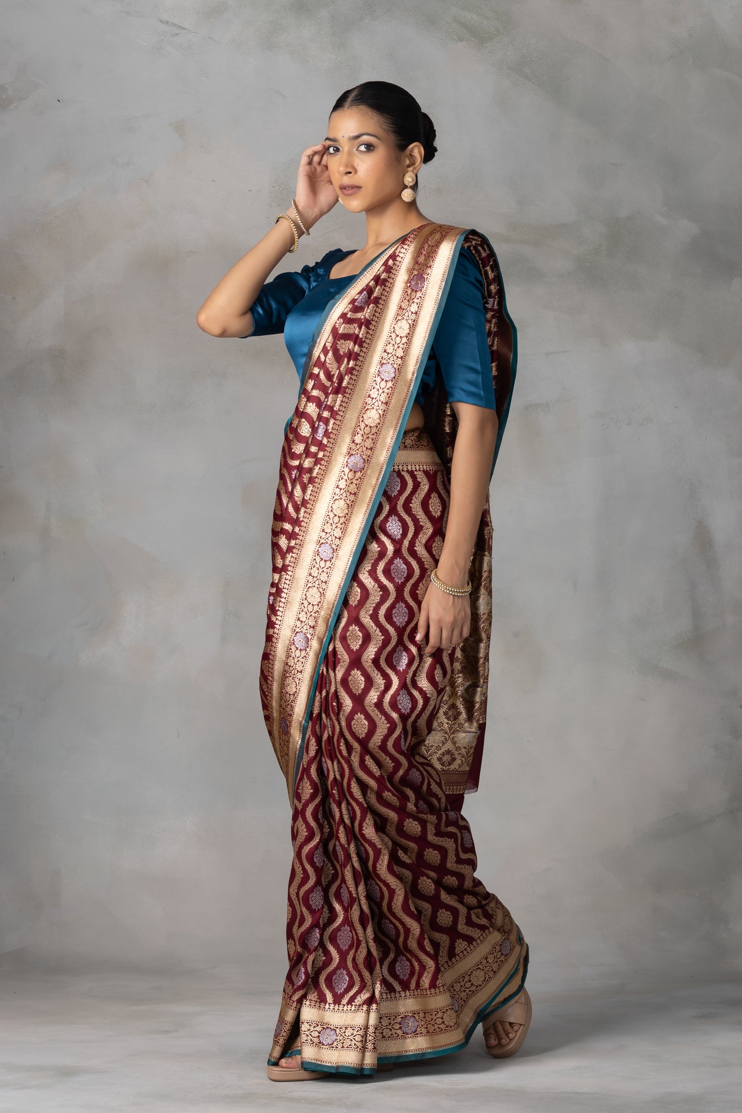 Deep Maroon Banarasi Silk Saree with Gold & Silver Zari Weave