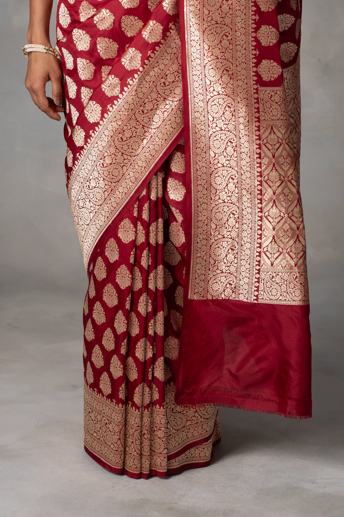 Deep Maroon Kadilyal Banarasi Silk Saree with Golden Zari Work