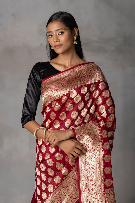 Deep Maroon Kadilyal Banarasi Silk Saree with Golden Zari Work